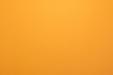 Panorama de fond uni en papier jaune vif pour création d'arrière plan.	