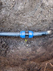 reparing water pipe damaged by shovel in ground when digging hole in garden with compression fitting