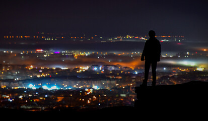 Man Watching the Mists Descending on the City