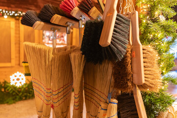 Handmade brooms and brushes are sold at the fair.