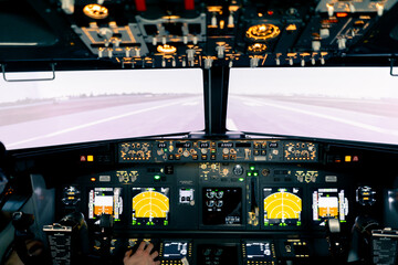 the radar control and navigation panel in the cockpit of the plane screens and buttons view from...