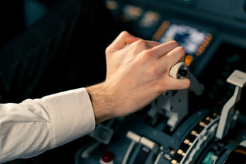 Airplane pilot controls throttle during flight or takeoff Cockpit view close-up of air traffic...