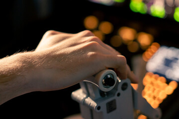 Airplane pilot controls throttle during flight or takeoff Cockpit view close-up of air traffic...