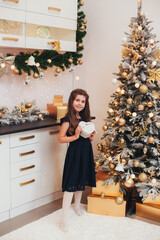 girl in home christmas room