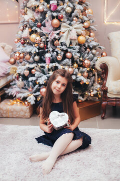 girl in home christmas room