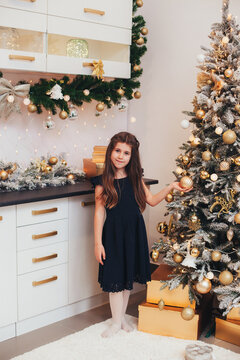 girl in home christmas room