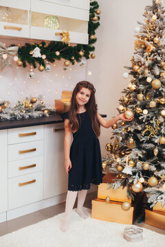 girl in home christmas room