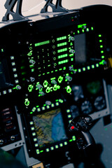 close-up of the cockpit of a passenger plane with many buttons on the control panel of an airplane...