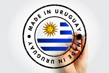 Made in Uruguay text emblem stamp, concept background - obrazy, fototapety, plakaty