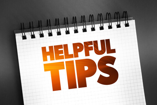 Helpful Tips text quote on notepad, concept background