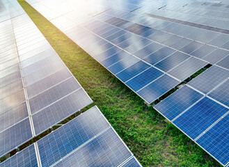 Solar farm and sun light. Solar power for green energy. Sustainable renewable energy. Photovoltaic...