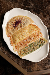 Traditional azerbaijani cuisine flat bread with herbs and meat