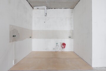 interior of the apartment without decoration in gray colors. rough finish