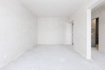 interior of the apartment without decoration in gray colors. rough finish