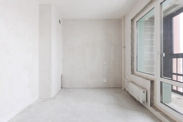 interior of the apartment without decoration in gray colors. rough finish
