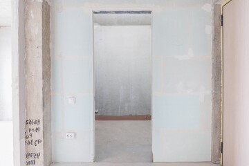 interior of the apartment without decoration in gray colors. rough finish