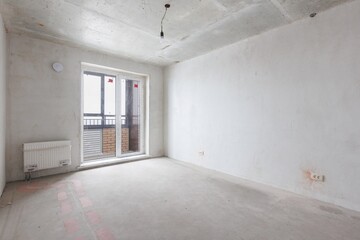 interior of the apartment without decoration in gray colors. rough finish