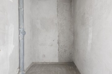 interior of the apartment without decoration in gray colors. rough finish