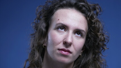 Woman rolling her eyes in contempt, cynical emotion of person rejecting gesture