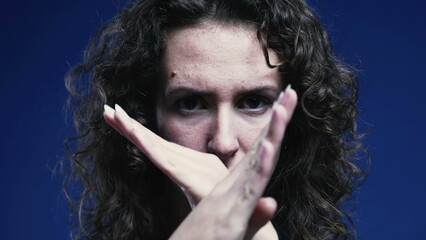 Woman waving finger saying 