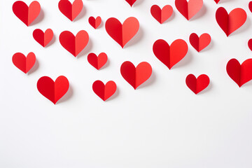 Paper art red hearts on white background.