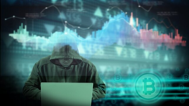 hooded male hacker and crypto currency concept