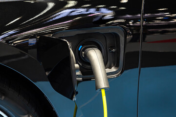 Power cord, pump, plug in, electric car charger, modern electric car