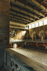 huge hall with norse nordic traditional paintings with beautiful light in town hall oslo