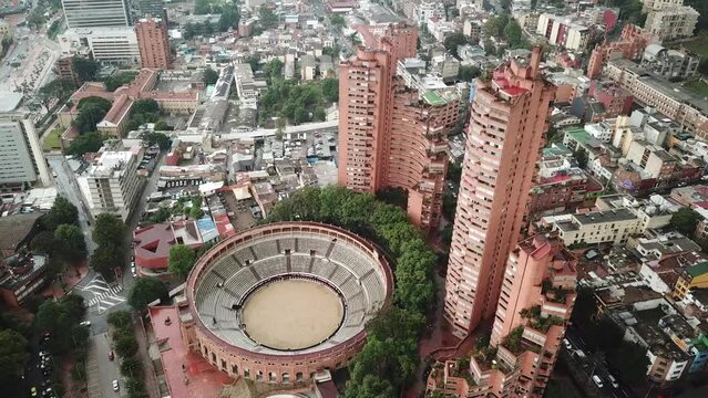 Aerial drone shot of Bogota downtown with Santamaria Bullring or Plaza de Toros de Santamaria, Colombia, Latin America. High quality 4k footage.