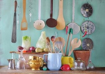 Kitchen and cooking still life with vintage kitchen utensils ,sweetheart cabbage,fennel and hot...
