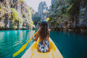 Beautiful woman enjoy the time at the lagoon in Coron, philippines. concept about tropical wanderlust traveling - obrazy, fototapety, plakaty