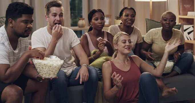 Friends, watching tv and living room with popcorn happy with bonding and conversation at home. Couch, chat and diversity of people together with movie, film and relax in a lounge with discussion