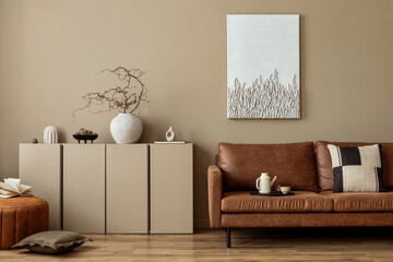Aesthetic composition of cozy living room interior with mock up poster frame, brown sofa, patterned...