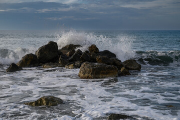 Fototapeta na wymiar waves crashing on rocks on the Mediterranean coast 13