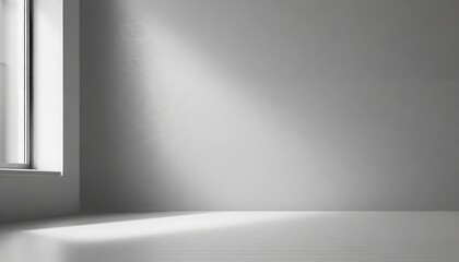 Obraz premium Minimalistic abstract light pearl color background for product presentation. Incident light from the window on the wall and floor