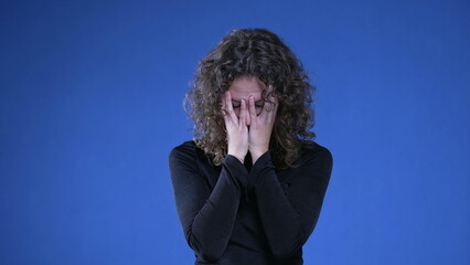 Frustrated Woman experiencing regret and confusion about past memories, female person in 20s...