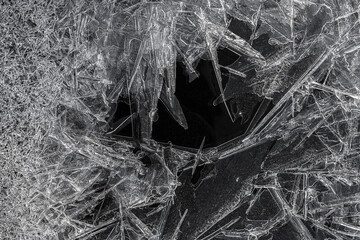 Intricate ice crystal formation with dark background