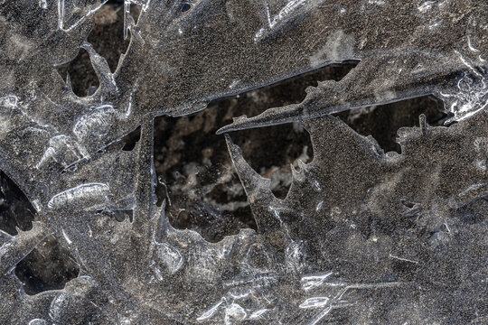 Intricate frozen patterns of natural ice texture