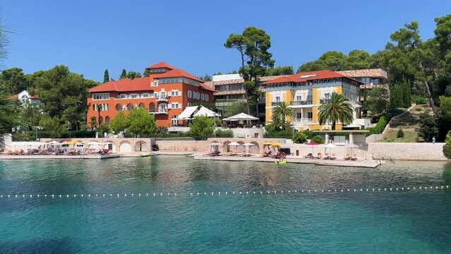 Steady shot of luxury villas in the Cikat Bay on the island of Losinj, Croatia