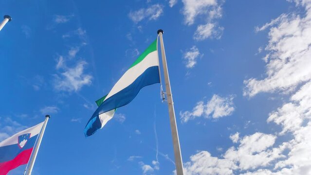 Sierra Leone flag waving in the wind. National flag of Sierra Leone.