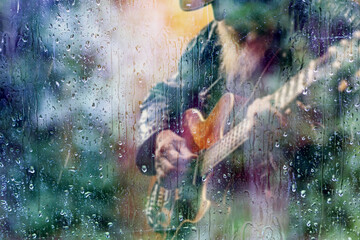 Fondo abstracto de guitarra y música country . Tocar en la guitarra canción detrás de la ventana...