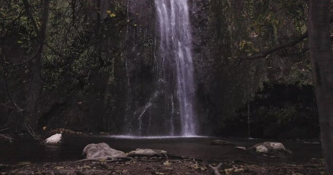 Waterfall in autmn. El chorrador del bosque, Millares (Valencia, Spain). Slow motion 4K, DCI.