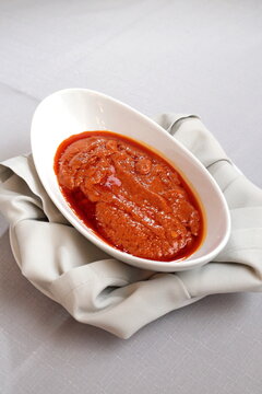 Sardella, classic Italian snack with garlic, tomato, garlic, onion, salt, pepper, coriander and olive oil