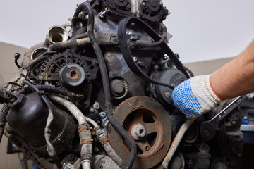 Engine valve car maintenance. The cylinder block of the four-cylinder engine. Disassembled motor...