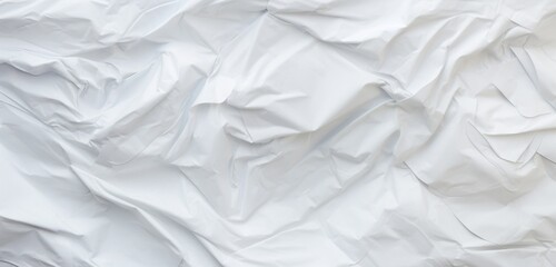 Close-up of a background made of crumpled white paper, abstract, copy space.