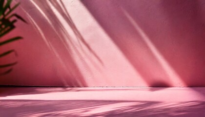 beautiful original background image of an empty space in pink tones with a play of light and shadow on the wall and floor for design or creative work