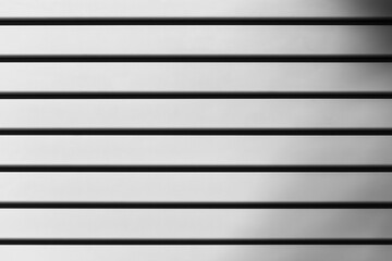 White background with shadows. A wall of white boards, a board texture with shadow lines and a differently lit surface