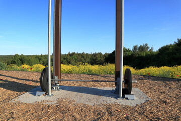 Barbell bar at one outside gym in nature. Strength training concept. Stockholm, Sweden, Scandinavia, Europe.