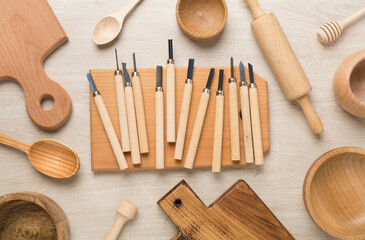 Carpenter tools with wooden objects on table ,top view