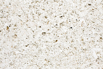 Sandstone texture. Grunge porous wall. Ancient structure closeup. Sand rock background. Grainy...